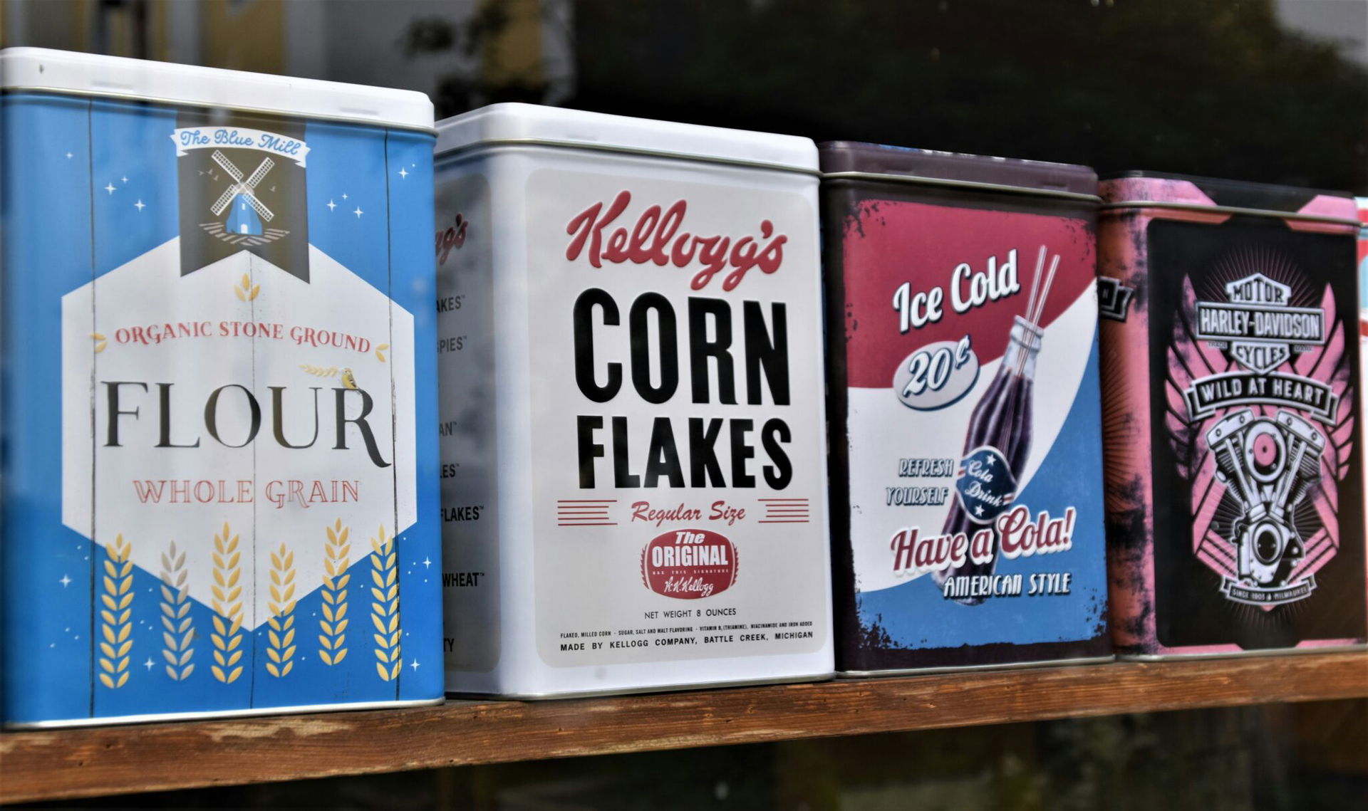 Retro tins of cereal brands displaying different types of brand identity